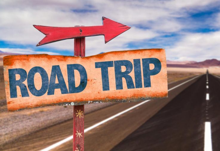Road Trip Sign On Road — Fast & Affordable Car Hires in Bilinga, QLD