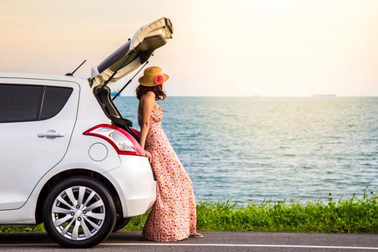 Girl Is Having a Break on The Side of The Road — Fast & Affordable Car Hires in Bilinga, QLD